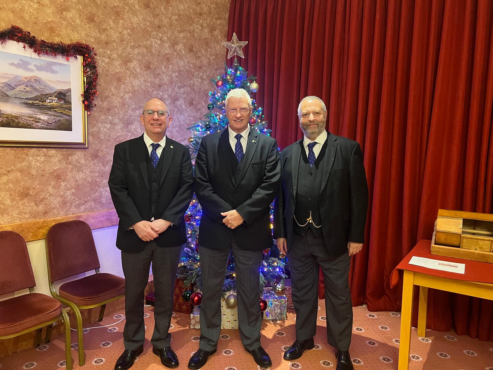 Brethren seated at a formal dinner table